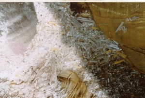 Close up of broken thermometers in scrapyard.